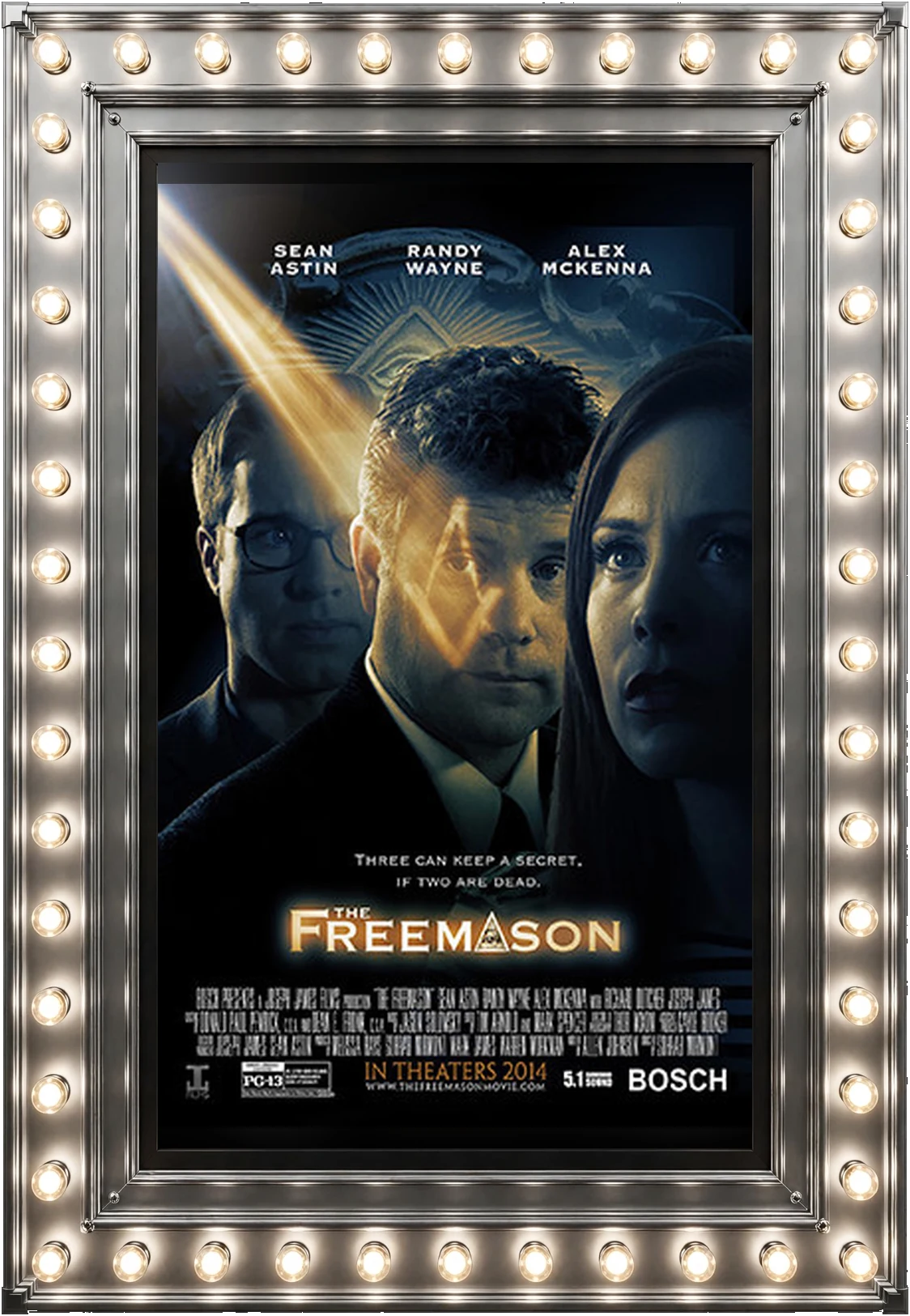 The Freemason — official movie poster in a polished-silver marquee display case lit by marquee bulbs